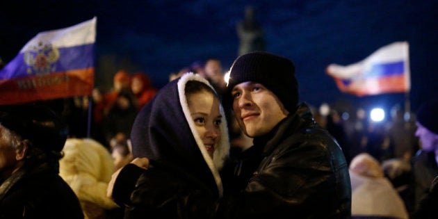 SIMFEREPOL, UKRAINE - MARCH 16: After finishing the referendum in Crimea, Pro-Russian people make celebrations at Lenin Square in Simferepol, Ukraine. (Photo by Bulent Doruk/Anadolu Agency/Getty Images)