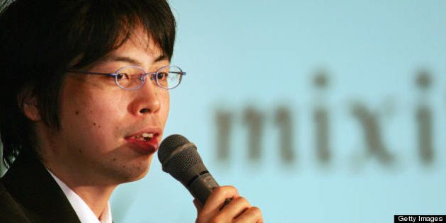 Tokyo, JAPAN: Kenji Kasahara, founder and president of Japan's most popular Internet networking site, Mixi. Inc., speaks during a news conference at the Foreign Correspondents' Club of Japan in Tokyo, 07 February 2007. Mixi has attracted around seven million users since its beginning in 2004. AFP PHOTO / KAZUHIRO NOGI (Photo credit should read KAZUHIRO NOGI/AFP/Getty Images)