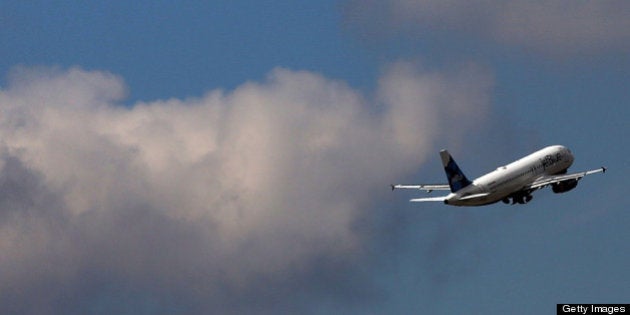 NEW YORK, NY - FEBRUARY 28: A plane takes off at John F. Kennedy Airport on February 28, 2013 in New York City. Should the $85 billion in automatic federal budget cuts, known as the sequester, go into effect Friday as scheduled, airport control towers in a number of states could close, putting pilots and staff members at risk. In addition to the closed control towers, Transportation Security Administration (TSA) workers could be furloughed, leading to long waits and confusion at many airport security checkpoints. (Photo by Spencer Platt/Getty Images)