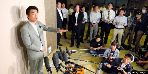 OSAKA, JAPAN - MAY 15: (CHINA OUT, SOUTH KOREA OUT) Toru Hashimoto, Osaka mayor and co-leader of the Japan Restoration Party speaks during a press conference at Osaka City Hall on May 15, 2013 in Osaka, Japan. Hashimoto said on May 13 that 'comfort women' were necessary for Japanese soldiers during World War II, but then softened his tone, saying that they served soldiers 'against their will.' (Photo by The Asahi Shimbun via Getty Images)