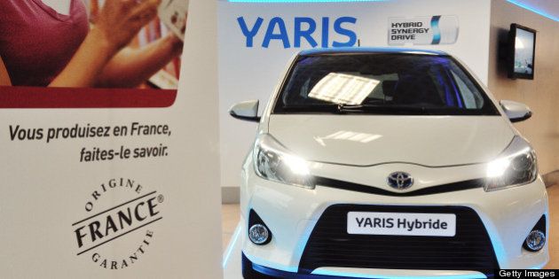 A Yaris is exhibited at the entrance at the plant of Japan's Toyota carmaker on October 8, 2012 in Onnaing, northern France. AFP PHOTO PHILIPPE HUGUEN (Photo credit should read PHILIPPE HUGUEN/AFP/Getty Images)