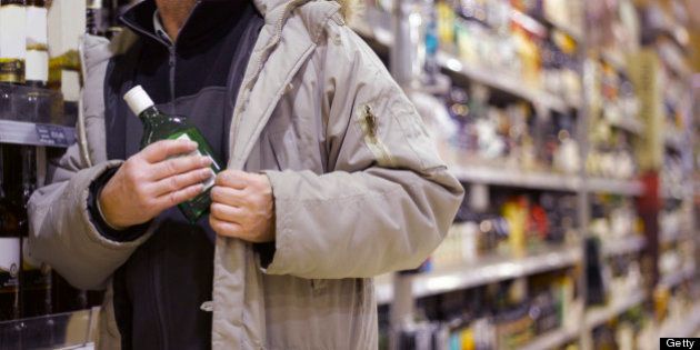 Alcoholic stealing gin from supermarket