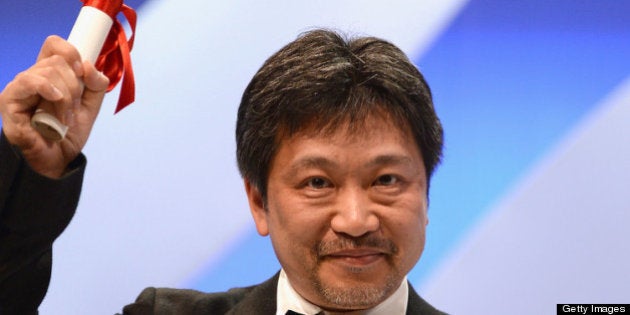 CANNES, FRANCE - MAY 26: Director Hirokazu Koreeda on stage after 'Soshite Chichi Ni Naru' receives the Prix Du Jury at the Inside Closing Ceremony during the 66th Annual Cannes Film Festival at the Palais des Festivals on May 26, 2013 in Cannes, France. (Photo by Pascal Le Segretain/Getty Images)