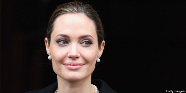 LONDON, ENGLAND - APRIL 11: Actress Angelina Jolie leaves Lancaster House after attending the G8 Foreign Minsters' conference on April 11, 2013 in London, England. G8 Foreign Ministers are holding a two day meeting where they will discuss the situation in the Middle East; including Syria and Iran, security and stability across North and West Africa, Democratic People's Republic of Korea and climate change. British Foreign Secretary William Hague will also highlight five key policy priorities. (Photo by Oli Scarff/Getty Images)