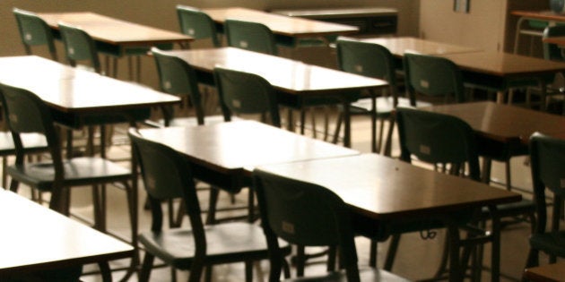 A view of a class room(chairs and tables) at a junior high school