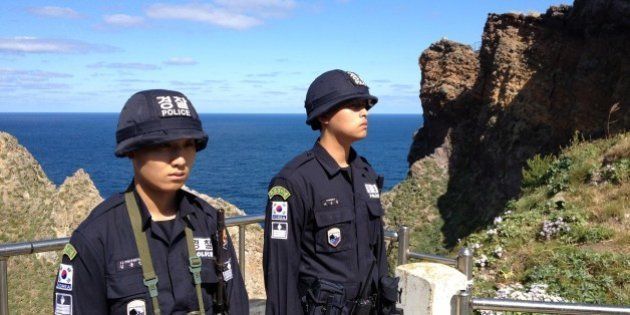 DOKDO ISLAND, SOUTH KOREA - OCTOBER 4: South Korean national police guard the islands in pairs positioned at various lookout points in South Korea on October 4, 2012. (Photo by Chico Harlan/The Washington Post via Getty Images)