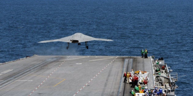 ATLANTIC OCEAN - MAY 14: In this handout released by the U.S. Navy, An X-47B Unmanned Combat Air System (UCAS) demonstrator launches from the flight deck of the aircraft carrier USS George H.W. Bush (CVN 77) May 14, 2013 in the Atlantic Ocean. George H.W. Bush is the first aircraft carrier to sucessfully catapult-launch an unmanned aircraft from its flight deck. The Navy plans to have unmanned aircraft on each of its carriers to be used for surveillance and be armed and used in combat roles. (Photo by U.S. Navy via Getty Images)