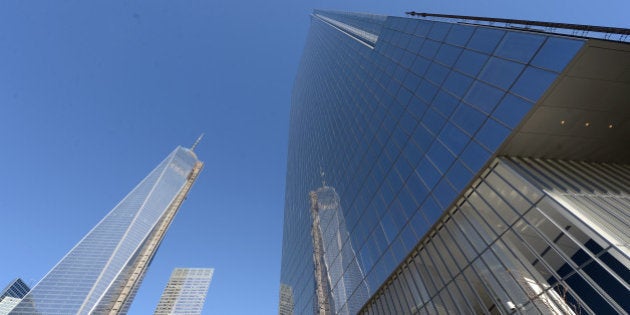 NEW YORK, USA - NOVEMBER 14: World Trade Center One is seen next to the newly-opened Four World Trade Center on November 13, 2013 in New York City. 978-foot (298-meter) Four World Trade Center is designed by Japanese architect Fumihiko Maki. (Photo by Cem Ozdel/Anadolu Agency/Getty Images)