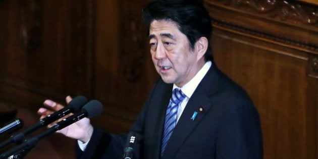 Shinzo Abe, Japan's prime minister, delivers his policy speech at the lower house of Parliament in Tokyo, Japan, on Tuesday, Oct. 15, 2013. Abe pledged to create a virtuous circle of higher employment and spending and to boost Japans role in global security, while giving few details on measures to spur investment and competitiveness.