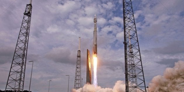 An AtlasV rocket, carrying the Maven spacecraft, blasts off at Cape Canaveral Air Force Station, Fla., on Monday, Nov. 18, 20131. Maven is on a 10-month journey will directly assess the atmosphere of the planet Mars. (Red Huber/Orlando Sentinel/MCT via Getty Images)