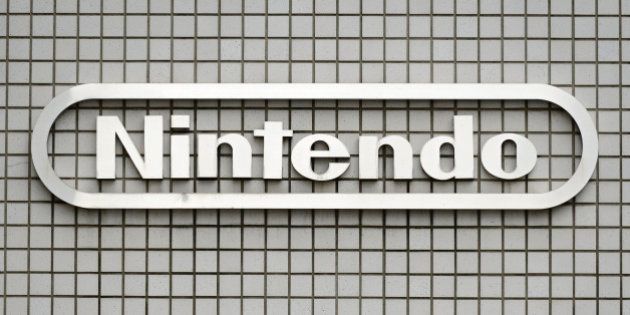 The Nintendo Co. logo is displayed outside the company's offices in Tokyo, Japan, on Tuesday, Oct. 29, 2013. Nintendo is scheduled to report second-quarter earnings on Oct. 30. Photographer: Akio Kon/Bloomberg via Getty Images