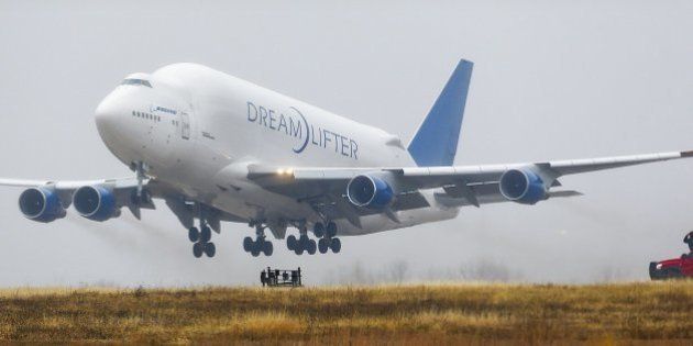 A Boeing 747 LCF Dreamlifter cargo plane takes off at Jabara airport in Wichita, Kan., on Thursday, Nov. 21, 2013. The plane was supposed to land at McConnell Air Force Base near Boeing's Wichita facility, but the pilot found the wrong airport. The plane was stuck at the airport until Boeing could determine if the runway was long enough for it to take off. (Fernando Salazar/Wichita Eagle/MCT via Getty Images)