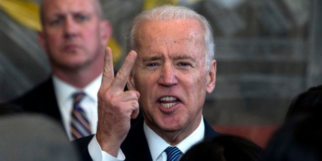 BEIJING, CHINA - DECEMBER 04: U.S. Vice President Joe Biden speaks as he meets visa applicants at the U.S. Embassy Consular Section on December 4, 2013 in Beijing, China. Biden is on the first leg of his week-long visit to Asia. (Photo by Ng Han Guan-Pool/Getty Images)