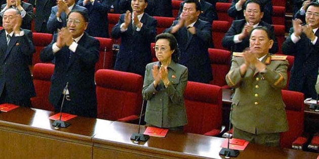 PYONGYANG, NORTH KOREA - SEPTEMBER 28: (JAPAN OUT) In this photo released by Korean Central News Agency via Korean News Service, Workers' Party of Korea delegates including Kim Kyong-Hui (3rd R in the front row), who is sister of leader Kim Jong-Il and was appointed as a military general, attend the party convention on September 28, 2010 in Pyongyang, North Korea. North Korean leader Kim was re-appointed as the party's secretary general and has made a military general of Kim Jong-Un, believed to be his third son. (Photo by Korean News Service via Getty Images)