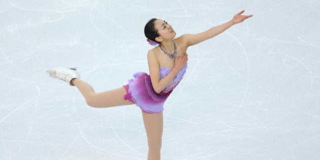 SOCHI, RUSSIA - FEBRUARY 08: Mao Asada of Japan competes in the Figure Skating Team Ladies Short Program during day one of the Sochi 2014 Winter Olympics at Iceberg Skating Palace on February 8, 2014 in Sochi, Russia. (Photo by Matthew Stockman/Getty Images)