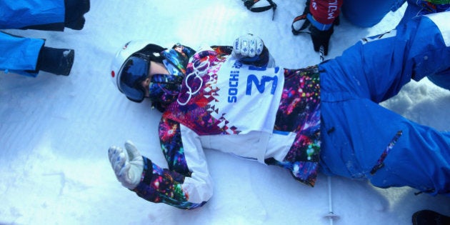 SOCHI, RUSSIA - FEBRUARY 06: Miki Ito of Japan suffers an injury in the warm up before the Ladies' Moguls Qualification at Rosa Khutor Extreme Park on February 6, 2014 in Sochi, Russia. (Photo by Ryan Pierse/Getty Images)