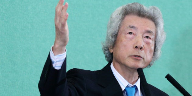 Junichiro Koizumi, former Japan prime minister, gestures as he speaks during a news conference at the Japan National Press Club in Tokyo, Japan, on Tuesday, Nov. 12, 2013. Prime Minister Shinzo Abe faces another prominent opponent to his plans to return to nuclear power after the Fukushima disaster, as Koizumi called for Japan to immediately abandon its reactors. Photographer: Tomohiro Ohsumi/Bloomberg via Getty Images