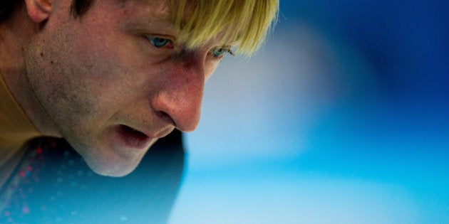 SOCHI, RUSSIA - FEBRUARY 13: Evgeny Plyushchenko of Russia is seen at at a warm up during the Men's Figure Skating Short Program on day 6 of the Sochi 2014 Winter Olympics at the at Iceberg Skating Palace on February 13, 2014 in Sochi, Russia. (Photo by Vladimir Rys Photography/Getty Images)