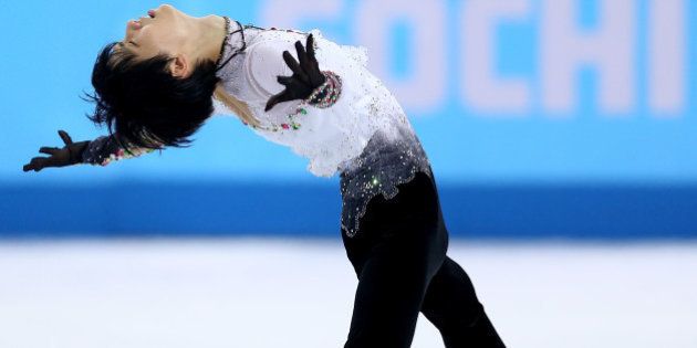 SOCHI, RUSSIA - FEBRUARY 14: Yuzuru Hanyu of Japan competes during the Figure Skating Men's Free Skating on day seven of the Sochi 2014 Winter Olympics at Iceberg Skating Palace on February 14, 2014 in Sochi, Russia. (Photo by Matthew Stockman/Getty Images)