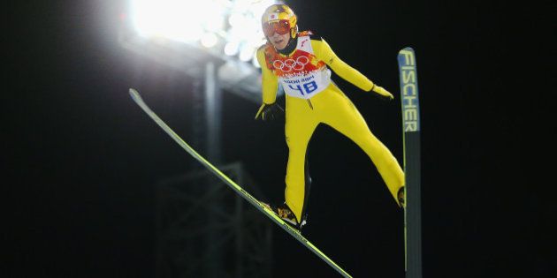 SOCHI, RUSSIA - FEBRUARY 09: Noriaki Kasai of Japan jumps during the Men's Normal Hill Individual trial on day 2 of the Sochi 2014 Winter Olympics at the RusSki Gorki Ski Jumping Center on February 9, 2014 in Sochi, Russia. (Photo by Julian Finney/Getty Images)