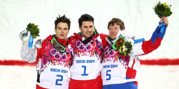 SOCHI, RUSSIA - FEBRUARY 10: (L-R) Silver medalist Mikael Kingsbury of Canada, gold medalist Alex Bilodeau...