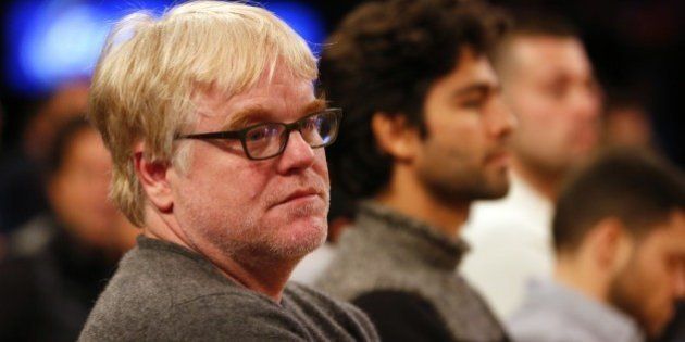 NEW YORK, NY - DECEMBER 25: American film actor Philip Seymour Hoffman looks on as the Oklahoma City Thunder play the New York Knicks during an NBA basketball game at Madison Square Garden on December 25, 2013 in New York City. The Thunder defeated the Knicks 123-94. NOTE TO USER: User expressly acknowledges and agrees that, by downloading and/or using this photograph, user is consenting to the terms and conditions of the Getty Images License Agreement. (Photo by Rich Schultz /Getty Images)