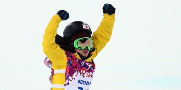 SOCHI, RUSSIA - FEBRUARY 12: Rana Okada of Japan celebrates after completing her run in the Snowboard...