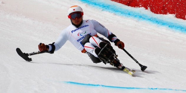 SOCHI, RUSSIA - MARCH 08: Akira Kano of Japan competes in Mens Downhill Sitting during day one of Sochi 2014 Paralympic Winter Games at Rosa Khutor Alpine Center on March 8, 2014 in Sochi, Russia. (Photo by Tom Pennington/Getty Images)