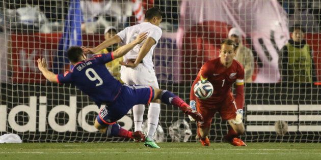 TOKYO, JAPAN - MARCH 05: (EDITORIAL USE ONLY) Shinji Okazaki #9 of Japan makes a goal during the Kirin Challenge Cup international friendly match between Japan and New Zealand at the National Stadium on March 5, 2014 in Tokyo, Japan (Photo by Atsushi Tomura/Getty Images)