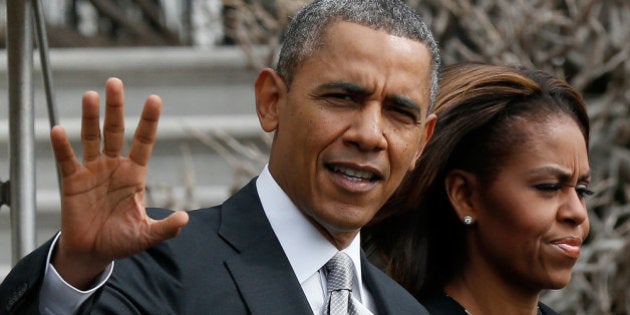 WASHINGTON, DC - MARCH 07: U.S. President Barack Obama and first lady Michelle Obama depart the White House March 7, 2014 in Washington, DC. Obama is scheduled to spend the weekend in Florida after an offical event today in Miami. (Photo by Win McNamee/Getty Images)