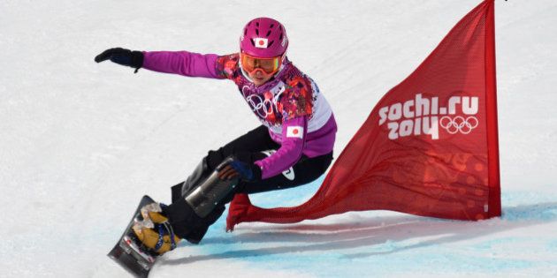 SOCHI, RUSSIA - FEBRUARY 19: Tomoka Takeuchi of Japan competes in the Snowboard Ladies' Parallel Giant Slalom Qualification on day twelve of the 2014 Winter Olympics at Rosa Khutor Extreme Park on February 19, 2014 in Sochi, Russia. (Photo by Lars Baron/Getty Images)