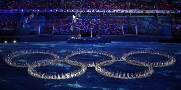 SOCHI, RUSSIA - FEBRUARY 23: Performers make the shape of the Olympic Rings during the 2014 Sochi Winter Olympics Closing Ceremony at Fisht Olympic Stadium on February 23, 2014 in Sochi, Russia. (Photo by Matthew Stockman/Getty Images)