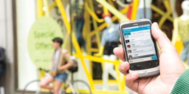 LONDON, UNITED KINGDOM - JUNE 15: A view of a man's hand as he uses a HTC Wildfire smartphone on the streets of London, during a shoot for Android App Guide, June 15, 2011, London. (Photo by Will Ireland/Android App Guide via Getty Images)