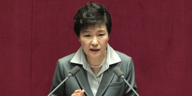 South Korean President Park Geun-hye delivers a speech on the government budget at the National Assembly in Seoul, South Korea, Wednesday, Oct. 29, 2014. Park asked lawmakers for cooperation to pass bills of her government's spending plan for 2015. (AP Photo/Ahn Young-joon)