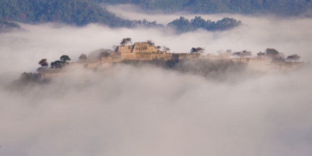 Japan, Kinki Region, Hyogo Prefecture, Asago - Hyogo, Takeda castle in foggy morning. (Photo by: JTB/UIG via Getty Images) (Photo by: JTB Photo/UIG via Getty Images)