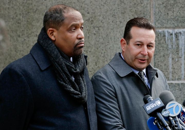 Two of Harvey Weinstein's attorneys, Ronald Sullivan (left) and Jose Baez, speak outside a Manhattan courthouse in January. Sullivan is currently in charge of Winthrop House at Harvard University, where he also teaches law and directs the school’s criminal justice institute. 