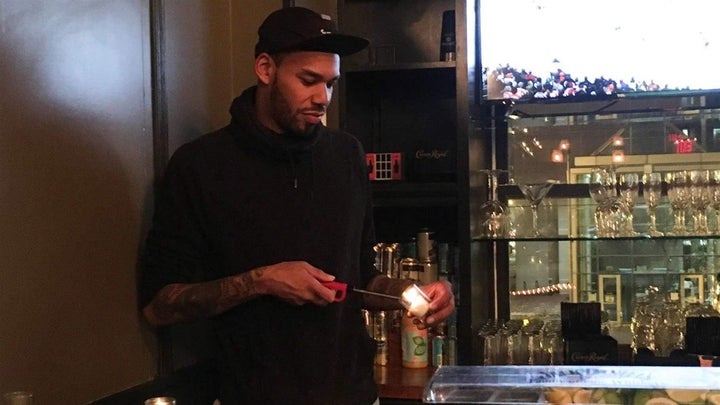 Tim Slayton, 36, lights a candle at Marvin, a 14th Street bar in Washington, D.C. The U.S. Census Bureau knows young urban renters are hard to get hold of. The agency is developing social media and other internet publicity to try to reach them for the 2020 census.