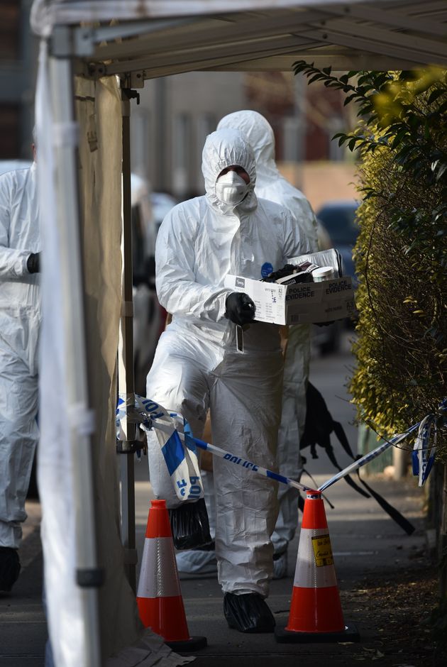 Forensic officers outside Bonhay Road, Exeter, where the body of a man aged 80 was found on Monday afternoon