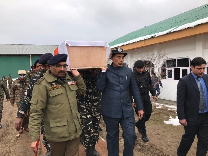 Rajnath Singh carries coffin of soldier killed in Pulwama attack.