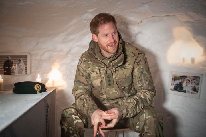 Prince Harry, Duke of Sussex, sits in a Quincey Shelter, a makeshift shelter built of snow, which doubled as a personal shrine to the royal and the Duchess of Sussex. 