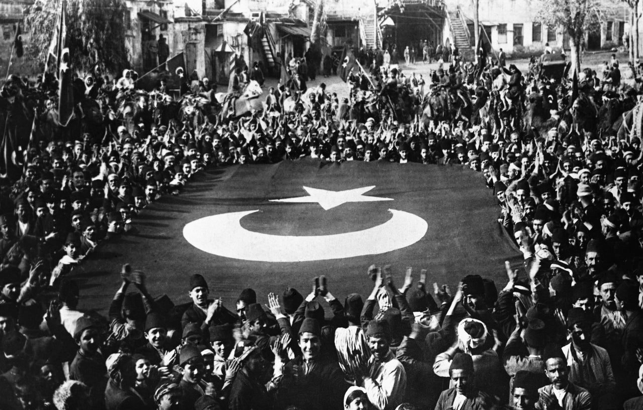 Ataturk Inspires Turkish NationalismTurkish nationalists celebrate following their defeat of the Greeks at Smyrna. 