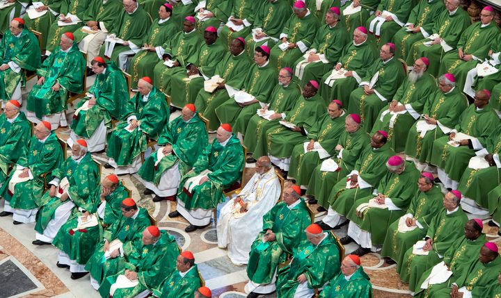 Cardinals and bishops attend a Mass celebrated by Pope Francis for the closing of a month-long Vatican meeting, on Sunday, Oct. 28, 2018. 