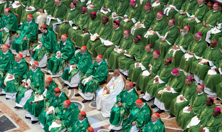 Cardinals and bishops attend a Mass celebrated by Pope Francis for the closing of a month-long Vatican meeting, on Sunday, Oct. 28, 2018. 