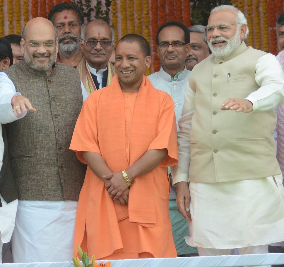 Amit Shah, Yogi Adityanath and Narendra Modi during the swearing-in ceremony in Lucknow on March 19, 2017.