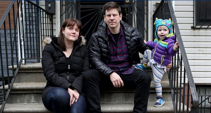 Erika Christensen, her husband, Garin Marschall, and their daughter, Pepper Marschall, age 1, at home in Brooklyn. (Photo: Yana Paskova for Yahoo News)