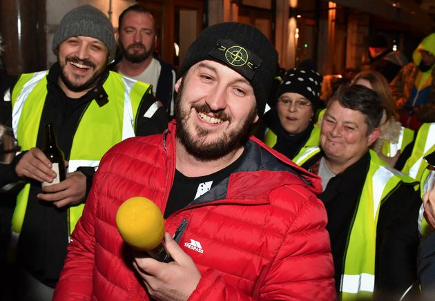 James Goddard (centre) has been charged with harassment and two public order offences 