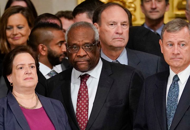 Justice Clarence Thomas (center) called for a re-evaluation of a 1964 Supreme Court ruling that could have major First Amendment implications.
