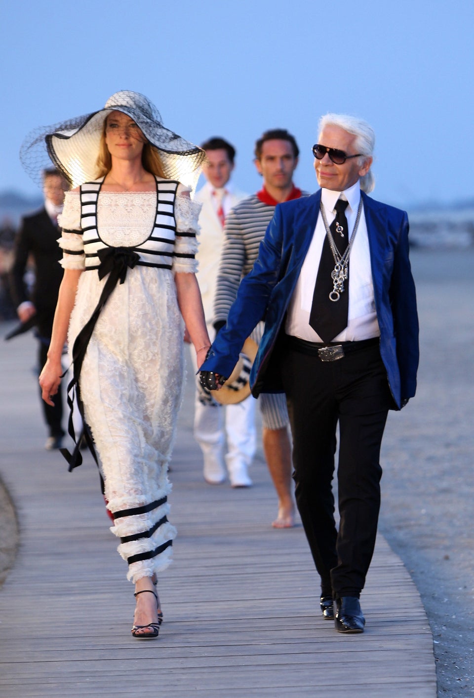 A Look Back At Designer Karl Lagerfeld's Iconic Fashion Career In Photos