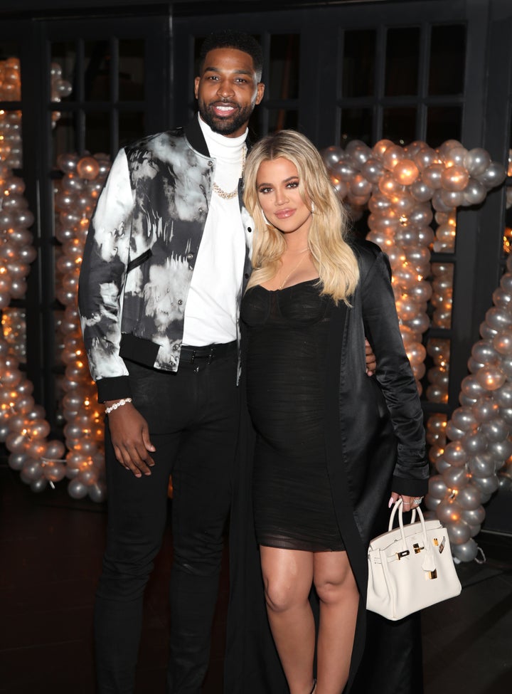 Tristan Thompson and Khloe Kardashian pose together at his birthday celebration in 2018. 