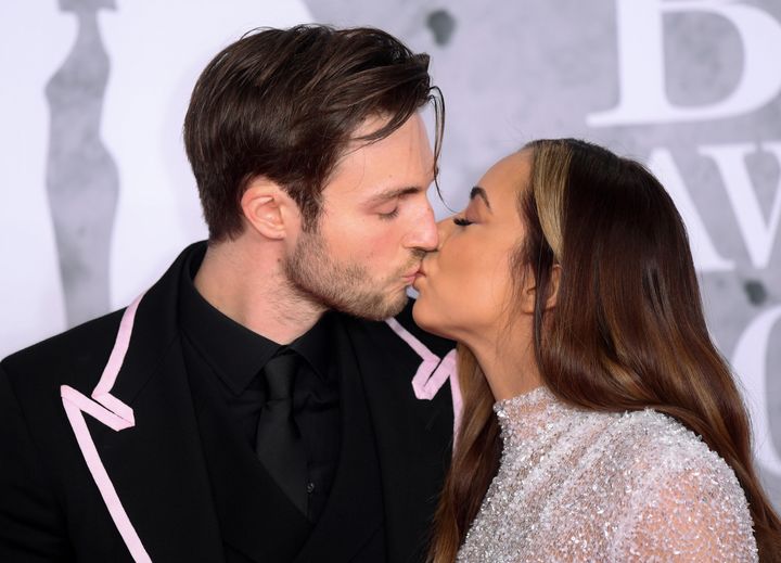 Jade and Jed share a kiss on the red carpet
